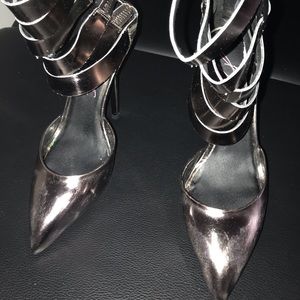 Keyshia Cole by Steve Madden size 7 with a dark chrome color.